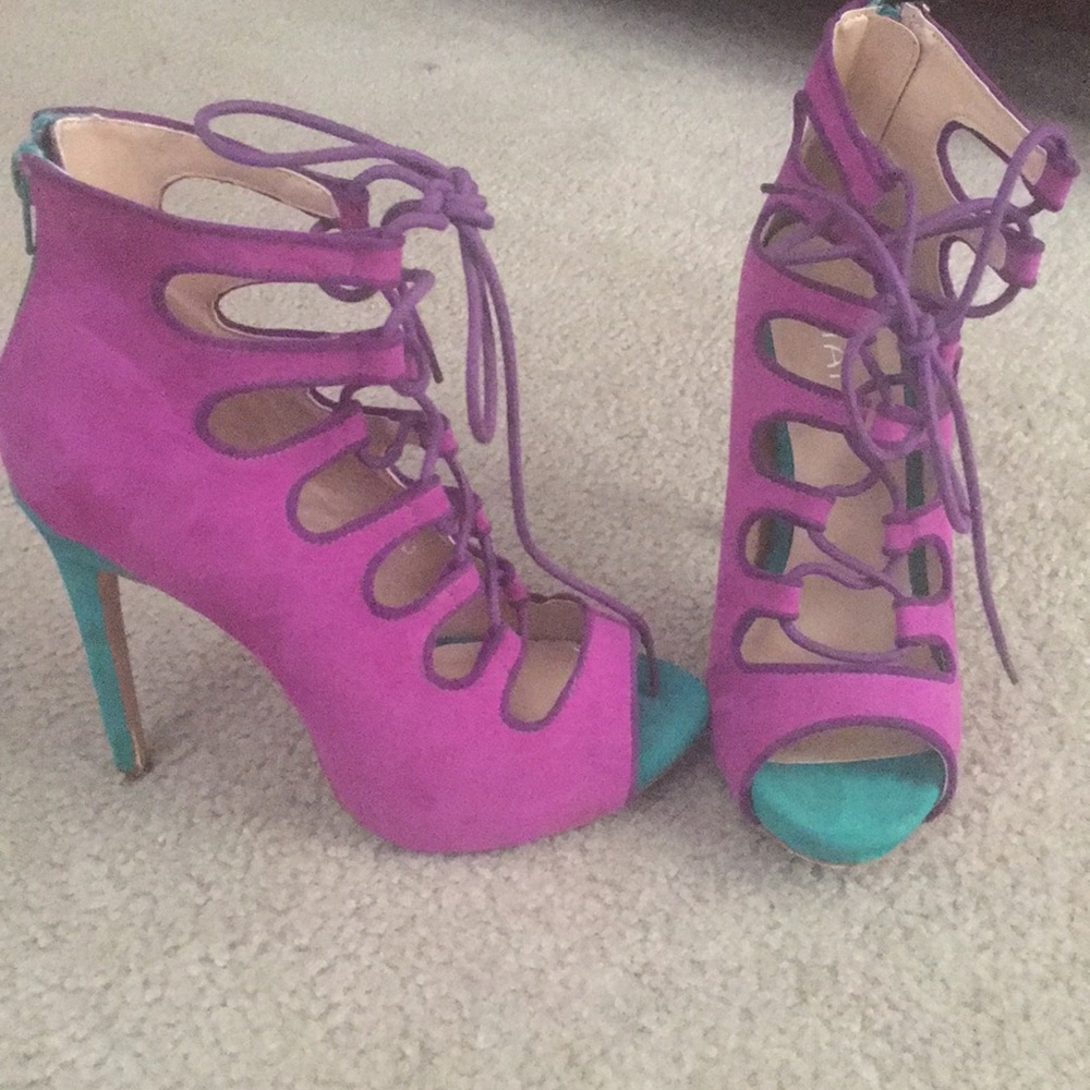 Purple lace up pumps with green heel